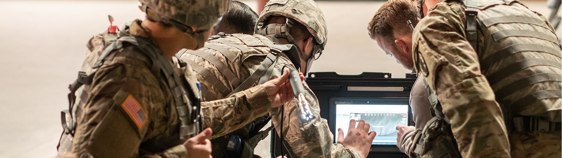 soldiers watching monitor