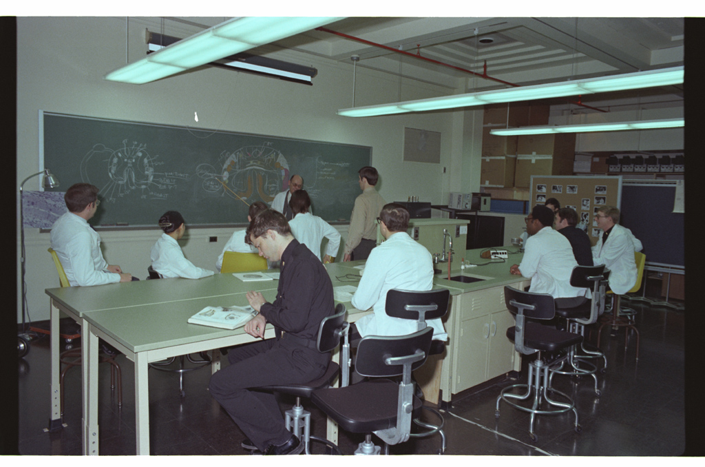 Students and faculty in classroom at the Armed Forces Forces Institute of Pathology